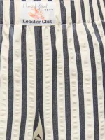 KOGMILANI_LABEL_PANT_WVN_3